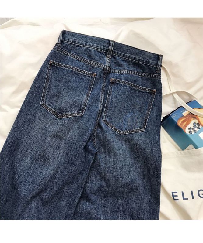 Широкие стильные джинсы с высокой посадкой